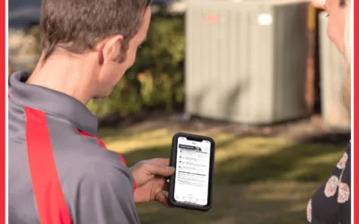 A man holding an iphone in his hand.